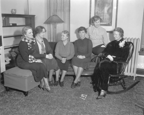 Women's Affairs committee at the University Club, 803 State Street. Left to right: Mrs. A.T. (Cornelia) Weaver, Prof. Helen White, Prof. Blanche Trilling, Dean Louise T. Greeley, Mrs. Walter (Helen) Meanwell and Mrs. Ralph (Jessie) McCanse.
