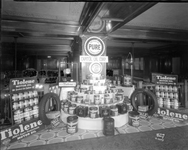 Display of Pure Oil Corp. products including Tiolene Motor Oil, and Yale Tires, at the Loraine Hotel by the Capitol Oil Corp.