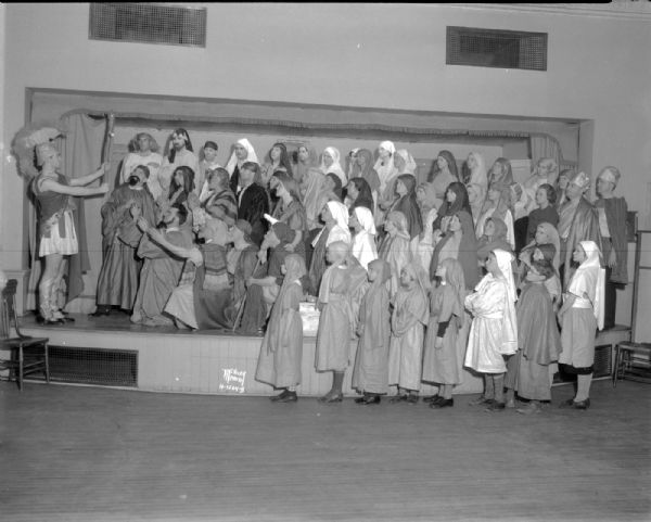 First Methodist Church, 203 Wisconsin Avenue. Easter pageant, with large group of actors in costume in a scene on "stage" in the chancel.
