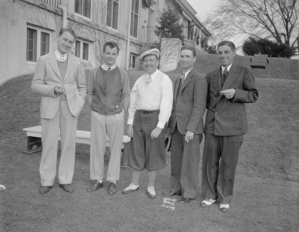 Five male golfers who will represent Wisconsin in the National Open Golf Tournament at Oakmont Country Club near Pittsburgh. Pictured l to r, at the Maple Bluff Country Club, are: Don McKenna, Maple Bluff amateur; Jimmy Milward, Nakoma Country Club amateur; Frances Gallett, Blue Mound professional, Milwaukee; Burle Gose, Tuckaway professional, Milwaukee; and Karl Schlicht, Nakoma Country Club professional. Nakoma became Nakoma Golf Club in 1944.