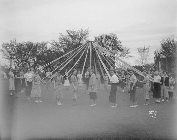 West Junior High School girls rehearsing May Pole Dance.