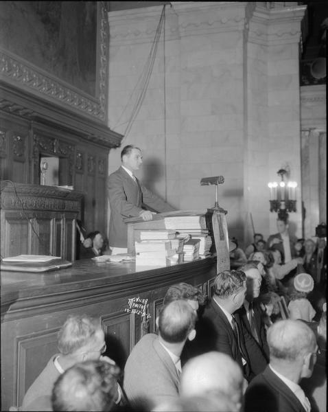 U.S. Senator Gerald P. Nye of North Dakota, at the podium, speaking in the Assembly Chambers at the 10th annual Robert M. La Follette Sr. Memorial Service.