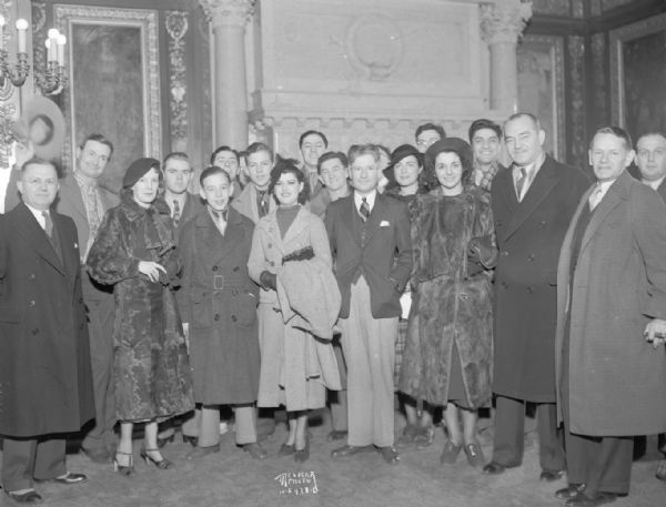 Group portrait of 20 winners on Major Bowes amateur radio hour, in town to perform at the Orpheum theater, with Governor Philip La Follette in the Capitol.