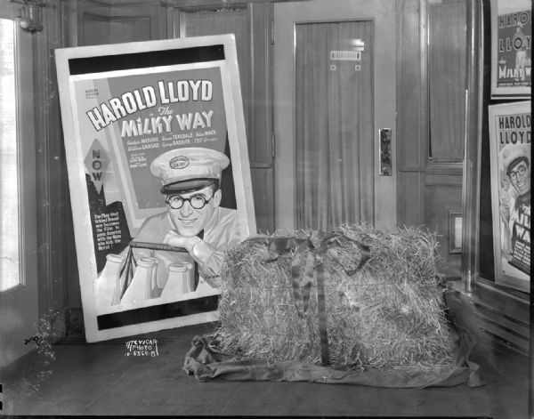 Poster of Harold Lloyd in "The Milky Way," and a bale of hay, on display in the lobby of the Parkway Theater, 6-10 West Mifflin Street.