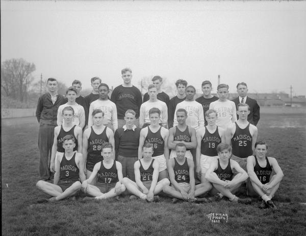 Outdoor group portrait of Central High School boys track team in uniform.