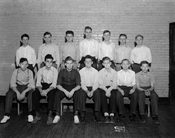 Group portrait of Central High School boys tennis team.
