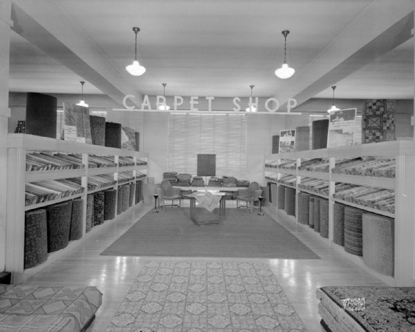 Display of carpets and rugs in Manchesters', 2-6 East Mifflin carpet shop.