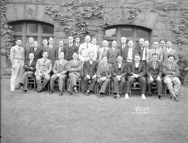 Group portrait of Madison Geology Club, taken outside of the north side of Science Hall, 550 N. Park Street.