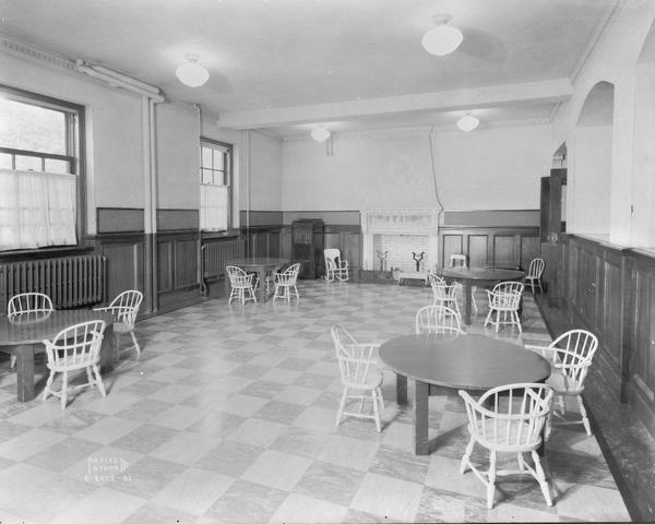 Play room, showing tables and chairs and fireplace, in Children's Orthopedic Hospital, 1415 Linden Drive.