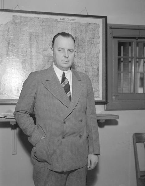 Portrait of John (Jack) Albright, former owner of the Club Monterey and one-time king of Madison gamblers, in jail, charged with keeping a gambling house, attempted bribery, conspiracy to bribe and possession of gambling devices.