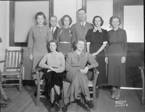 Group portrait of six non-University Court of Honor members for President's birthday ball with Roundy Coughlin and another man.