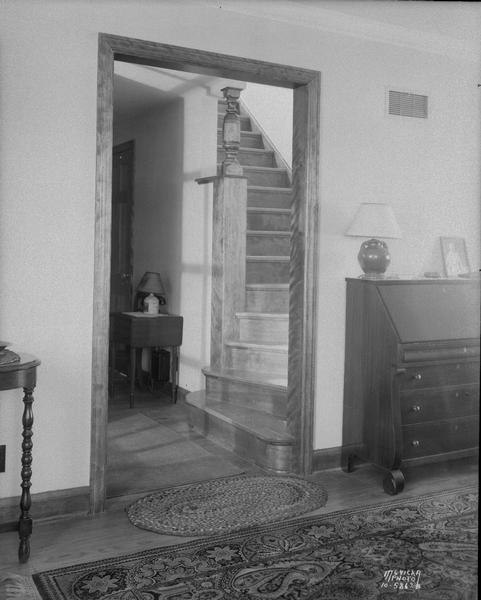 Stairway in entrance hall from living room in Coombs house, 212 Lakewood Boulevard.