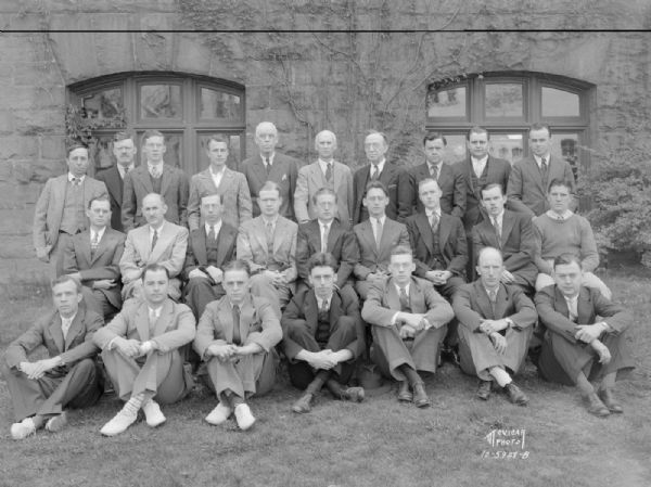 Group portrait of men in the Geology Club, taken in front of the north side of Science Hall, University of Wisconsin-Madison.