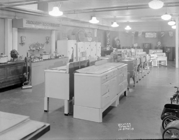 Home appliance department in the Burdick and Murray department store, 26 N. Carroll Street, featuring Royal Rochester and Grunow appliances.