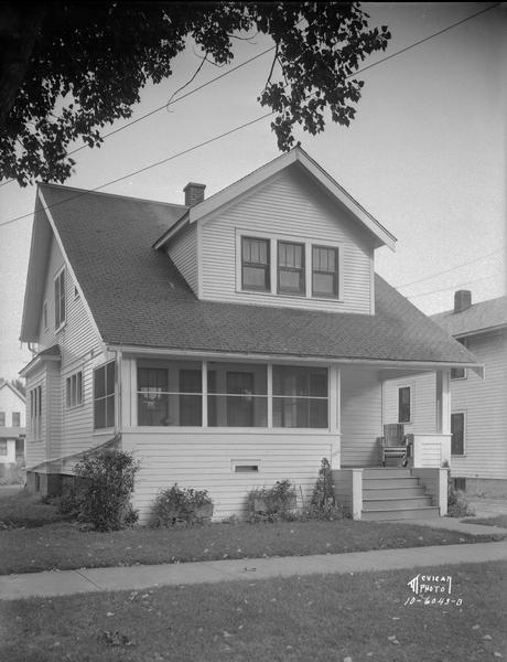 View from street towards a house at 1914 E. Dayton Street.
