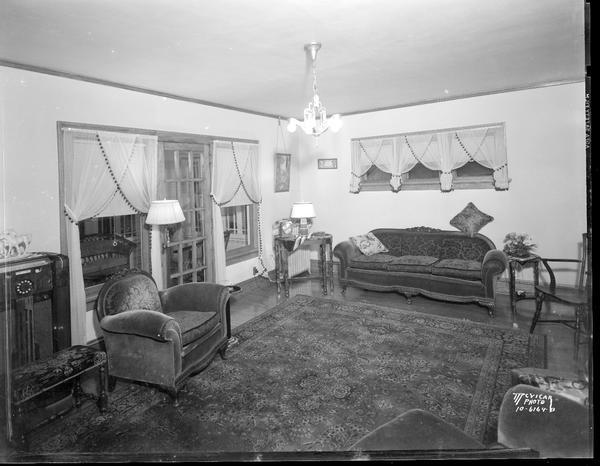 Living room and sun porch in Elwin G. Waste's house, 1321 Jenifer Street.