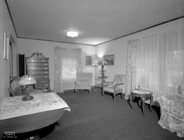 Mrs. Kate (widow of Leonard) Gay's living room, looking north, Apartment 101, Lyon Apartment Building, 330 N. Carroll Street.