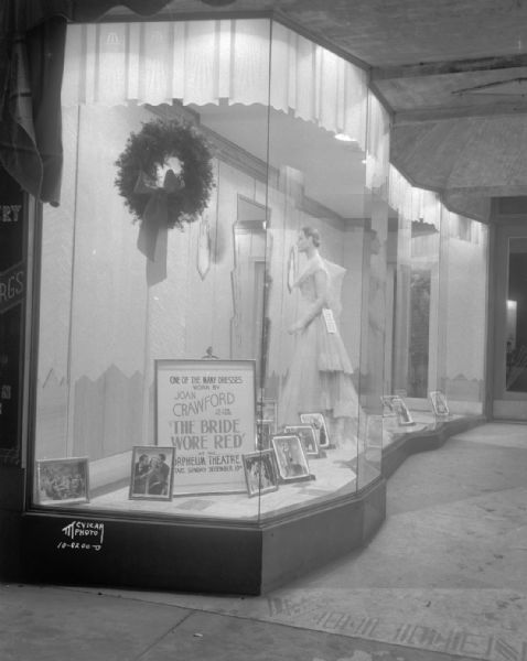Woldenberg's, 26 E. Mifflin Street, "Joan Crawford" window taken for the Orpheum Theatre. "One of the many dresses worn by Joan Crawford in the picture 'The Bride Wore Red.'"