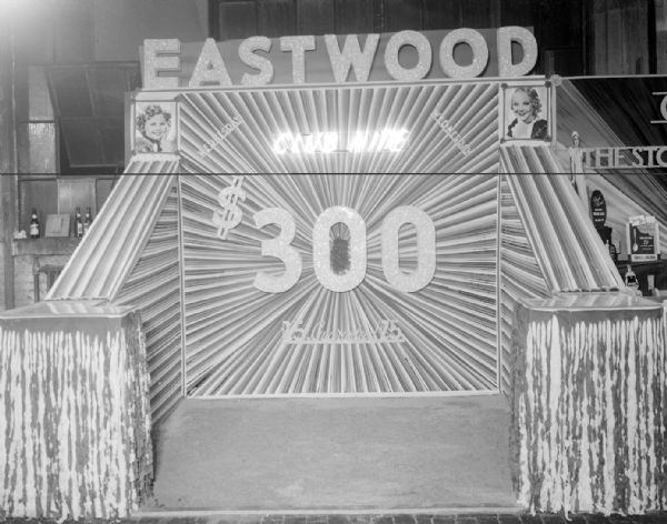 Eastwood Theatre booth at the East Side Business Men's Association fall festival. "Wednesday, Club Nite $300.00, $25.00 guaranteed."