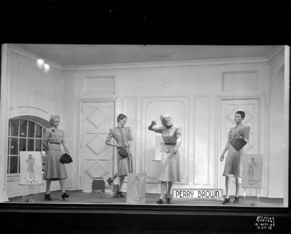 Kessenich's, 2101-03 State Street display window showing four mannequins in Perry Brown dresses.