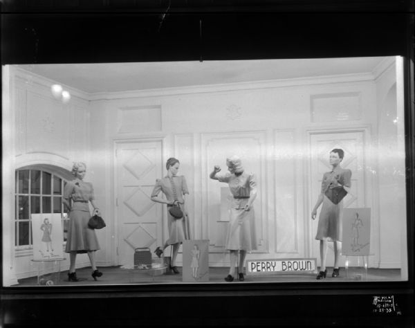 Kessenich's, 201-03 State Street display window showing four mannequins in Perry Brown dresses.