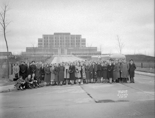 Group portrait of students from Madison College, in front of Forest Products Laboratory, 709 Highland Avenue.