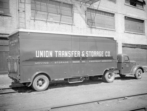 Union Transfer & Storage Co. moving van parked at the rear of their building, 155-303 E. Wilson Street.