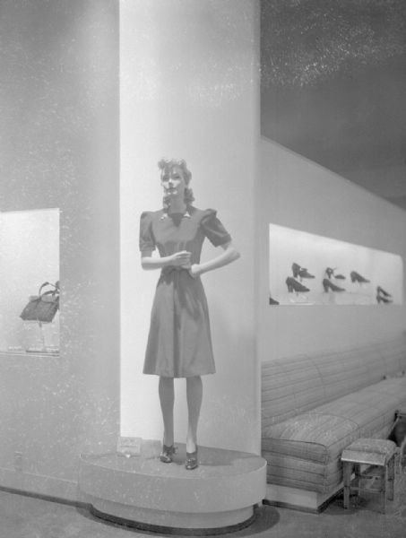 Manchester's Department Store, 2-6 East Mifflin Street. Mannequin in a dress with shoe department display and purse display, second floor remodeling.