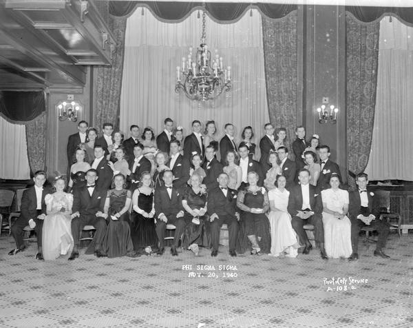 Group portrait of Phi Sigma Sigma sorority formal party at the Loraine Hotel.