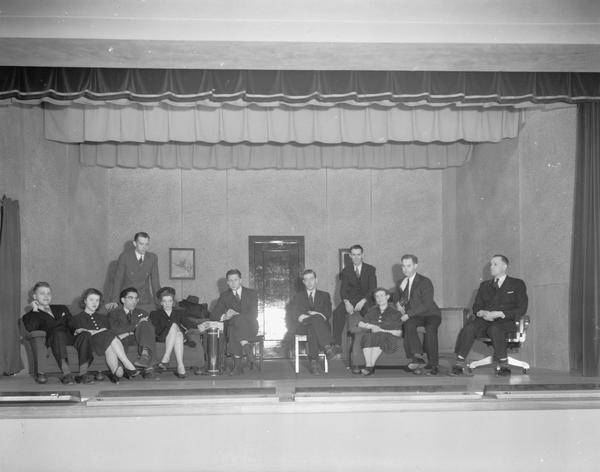 Group portrait of 11 cast members of the Blackfriars Guild on stage in "Fog Over Mars."