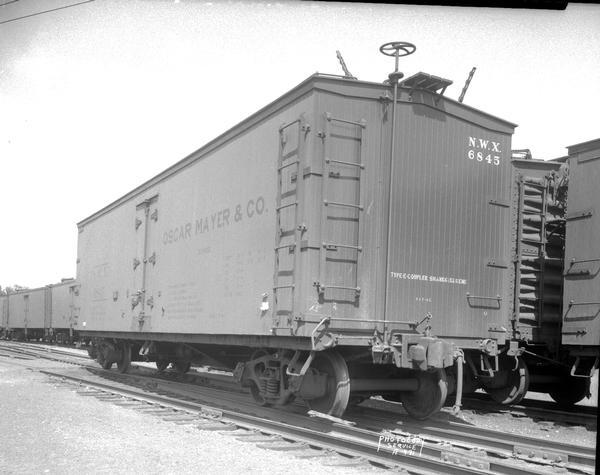 Left side view of an Oscar Mayer refrigerated railroad car, Chicago and Northwestern Railway car number N.W.X.6845.