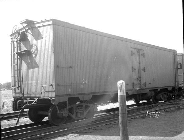 Right side view of Oscar Mayer refrigerated railroad car on the Chicago & Northwestern Railway, car number URTX 5365.