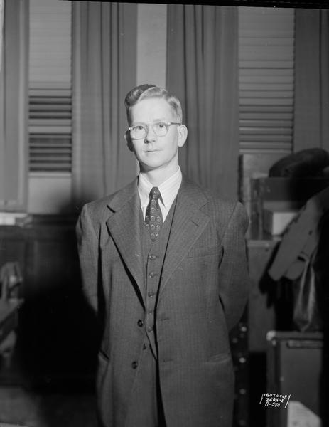 Portrait of Donald F. Goodrich, a teller at First National Bank.