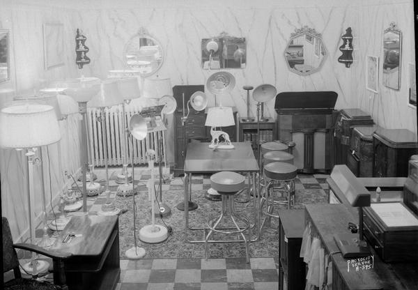 Interior of Wisconsin Electric Cooperative Store, in Wisconsin Union Transfer Building, 155-303 West Wilson Street, showing lamps, mirrors and radios.   