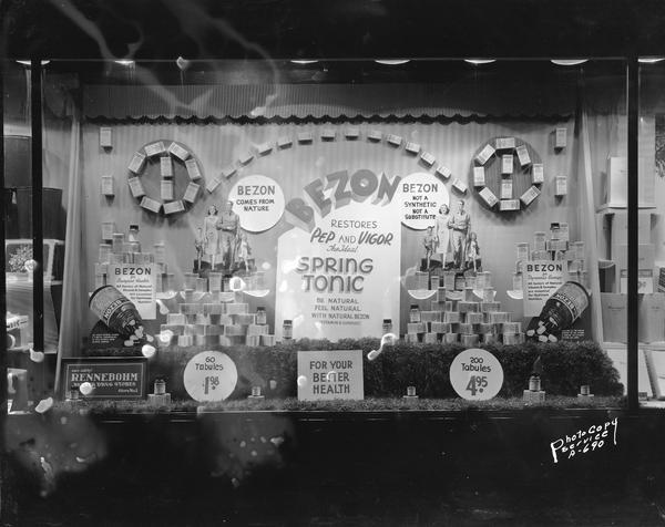 Window display for "Bezon" spring tonic at Rennebohm Drug Store #1, 1357 University Avenue at the corner of Randall Avenue.