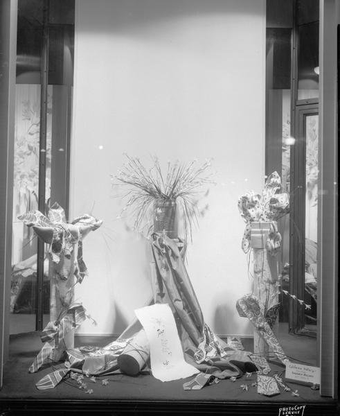 F.W. Karstens Company, 24 North Carroll Street, center display window featuring neckwear.