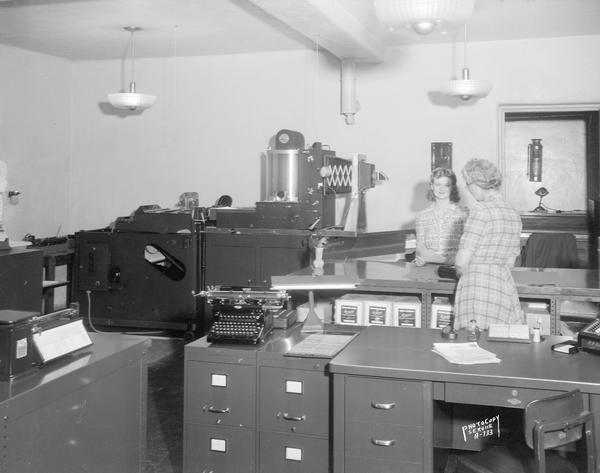 Dane County Court House office, 207 West Main Street, showing two women working at a Duplex Rectigraph machine.