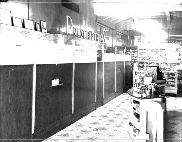 Interior view of Prescription Pharmacy, 26 South Carroll Street, showing prescription window.