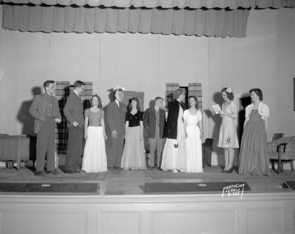Ten student actors and actresses in costume on stage for "Mummy and the Mumps" at Edgewood High School 2206 Monroe Street.