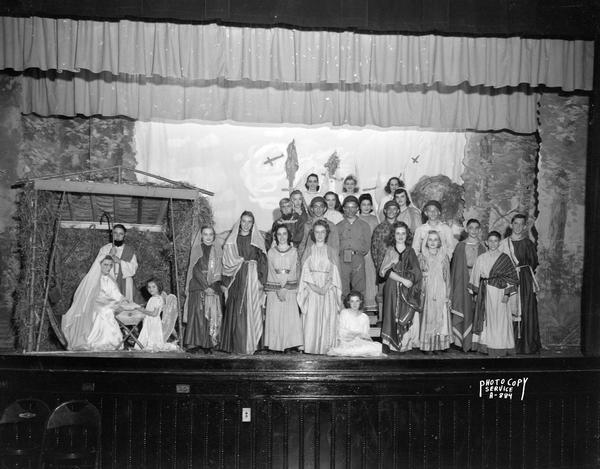 Nativity play cast in costume on stage at Holy Redeemer School, 140 West Johnson Street.