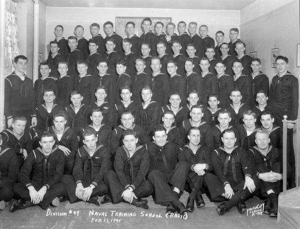 Group portrait of U.S. Naval Training School (Radio), Division #49, trainees, University of Wisconsin-Madison.