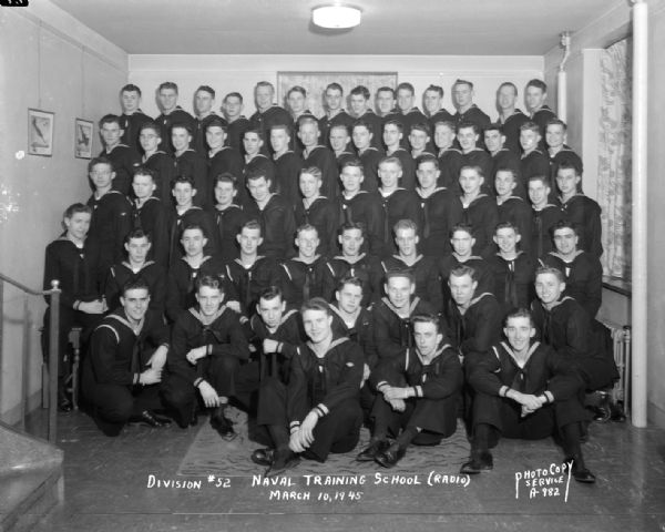 Group portrait of U.S. Naval Training School (Radio), Division #52, trainees, University of Wisconsin-Madison.