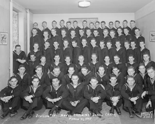 Group portrait of U.S. Naval Training School(Radio), Divison #55, trainees, University of Wisconsin-Madison campus.