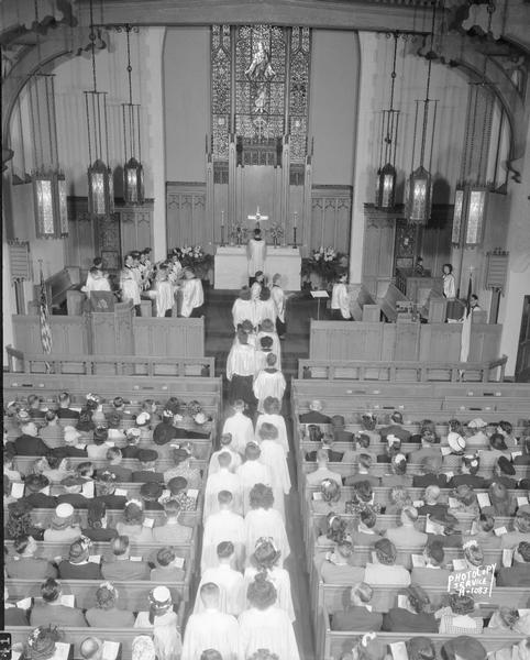 Bethel Lutheran Church choir entering the chancel area, 318 Wisconsin Avenue. Elevated view taken from the balcony.