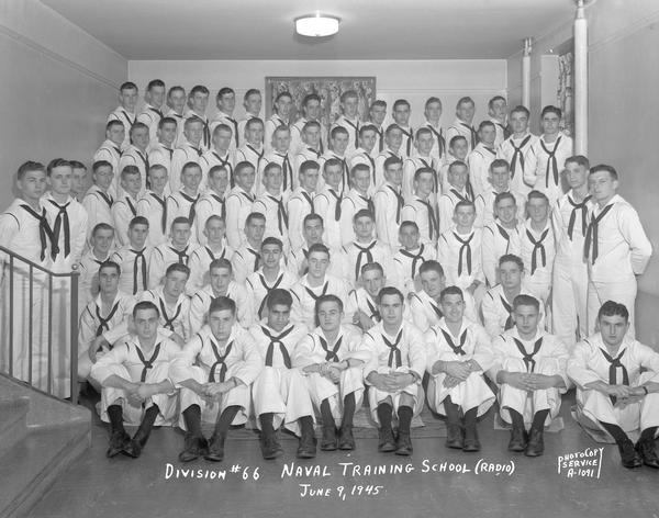 Group portrait of U.S. Naval Training School (Radio), Division #66, trainees at University of Wisconsin-Madison.