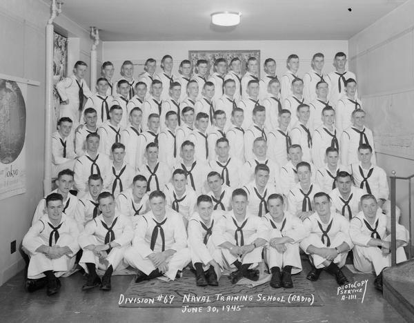 Group portrait of U.S. Naval Training School (Radio), Division #69, trainees at University of Wisconsin-Madison.
