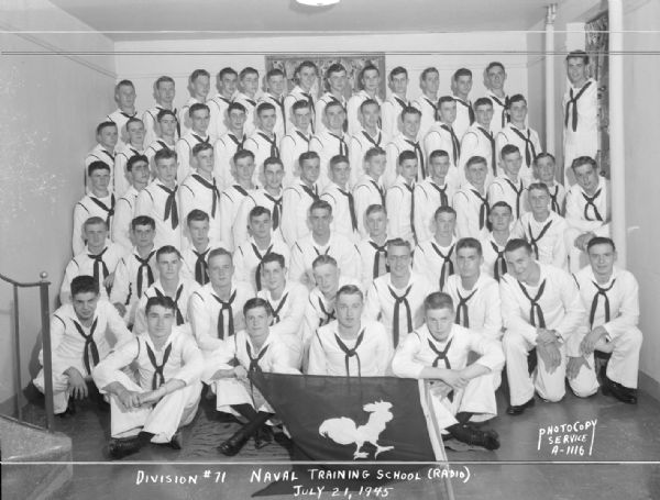 Group portrait of U.S. Naval Training School (Radio), Division #71, trainees at University of Wisconsin-Madison.