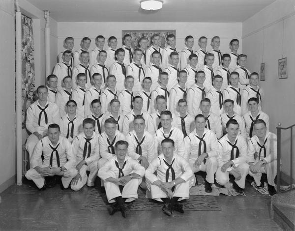 Group portrait of U.S. Naval Training School (Radio), Division #74, trainees at University of Wisconsin-Madison.