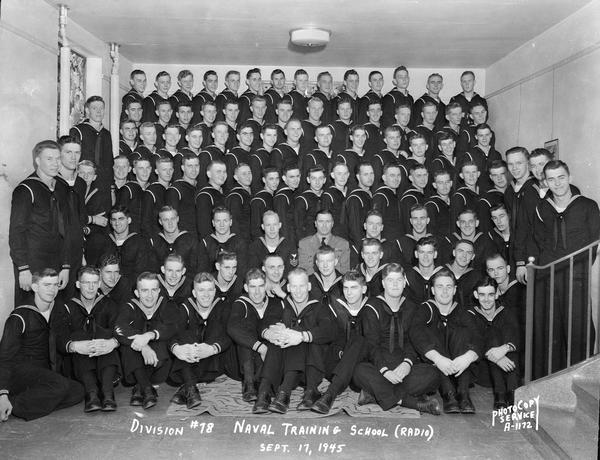 Group portrait of U.S. Naval Training School (Radio), Division #78, trainees at University of Wisconsin-Madison. This is the final class.