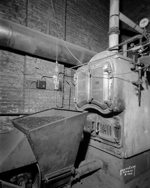 Kewaunee boiler and Anchor stoker in the basement of the Women's Building.